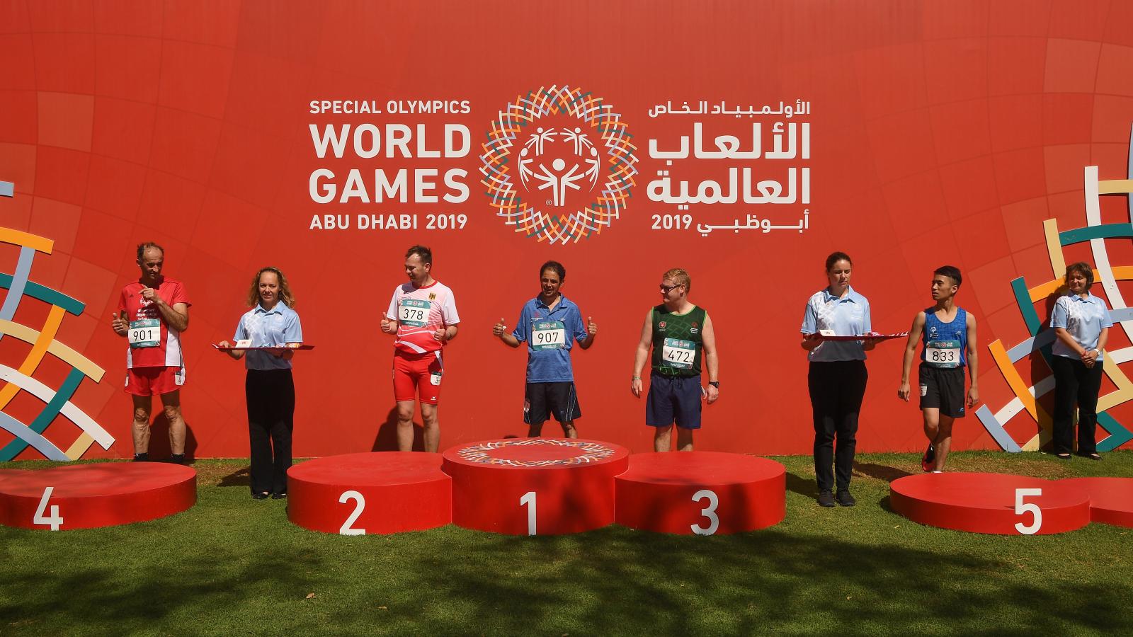 Athletes standing in front of presentation podium prior to medal presentation at World Games